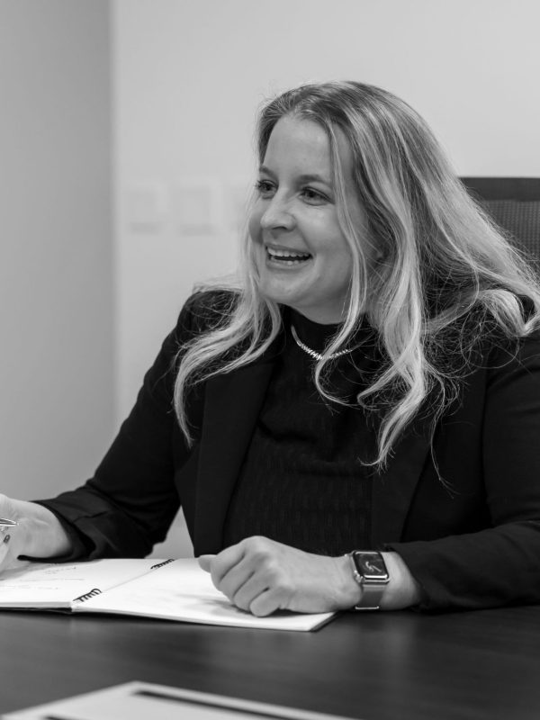 leslie-office-photo woman-in-neil-jesani-office-meeting-with-client